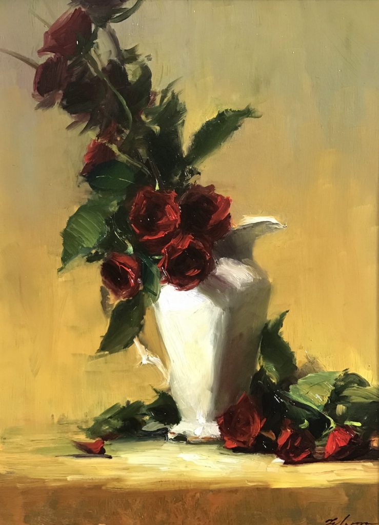 A photo of an original oil painting on panel of a still life painting of red roses in an ivory vase.