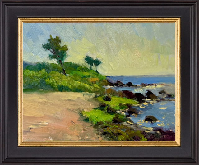 Coastal landscape oil painting featuring a rocky shoreline, vibrant green bushes, and a calm ocean under a pale, lightly clouded sky.
