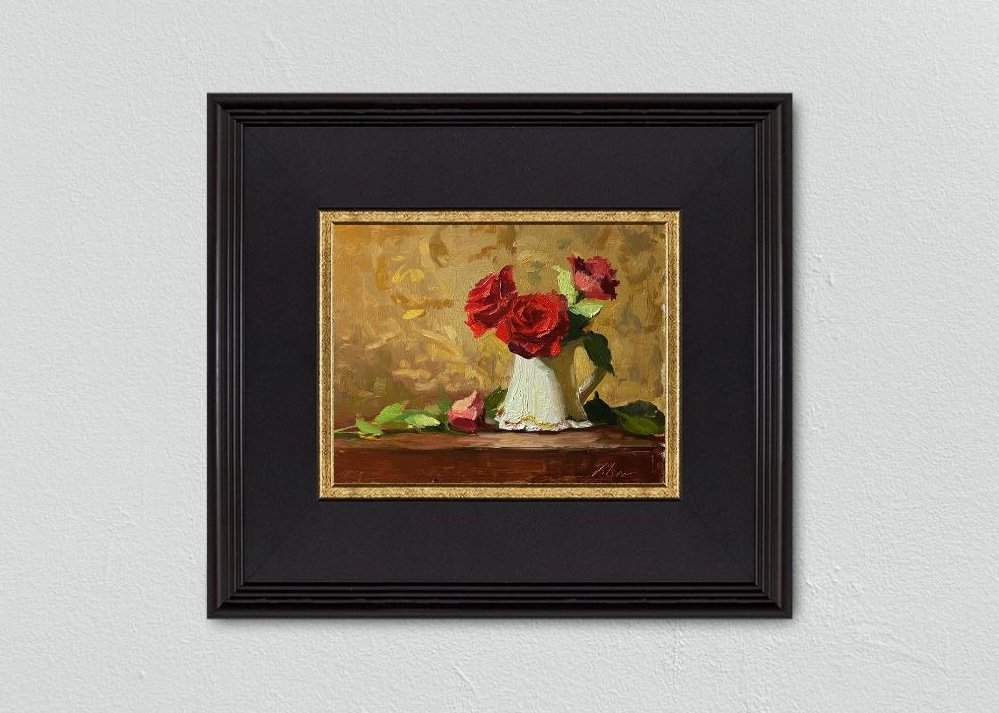 Explore the timeless elegance of an 8x10 inch still life oil painting by Kelli Folsom, showcasing vibrant red roses in a creamer pitcher on a tabletop. Painted in Folsom's distinctive loose style, this artwork captures the romantic allure of the roses against the soft creamer pitcher and tabletop backdrop. The loose brushwork infuses the composition with a sense of spontaneity and movement, inviting viewers to immerse themselves in the beauty of the scene. Bring a touch of floral sophistication to your space with this captivating artwork by Folsom.