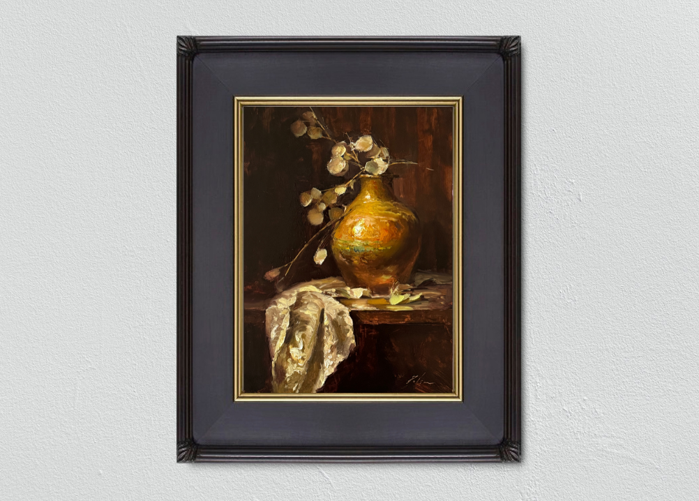 Elegant oil painting featuring a gleaming copper vase with reflective golden tones, set against a dark background. Delicate branches with white leaves add contrast, while a richly textured lace cloth drapes gracefully across the table. A striking still life that evokes warmth and timeless beauty.