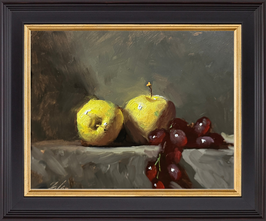 Still life oil painting of two yellow apples and a cluster of red grapes resting on a stone surface, with rich shadows and textured brushwork emphasizing light and form.
