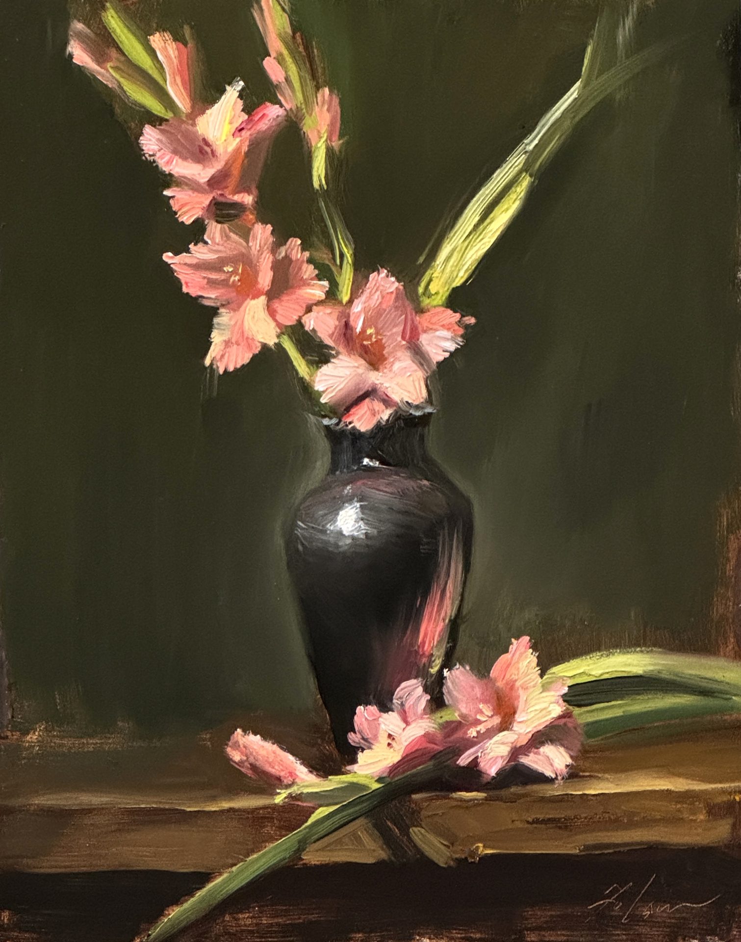 Oil painting of soft pink gladiolus flowers arranged in a tall dark vase, with blossoms resting gracefully on a wooden table, elegant floral still life artwork.