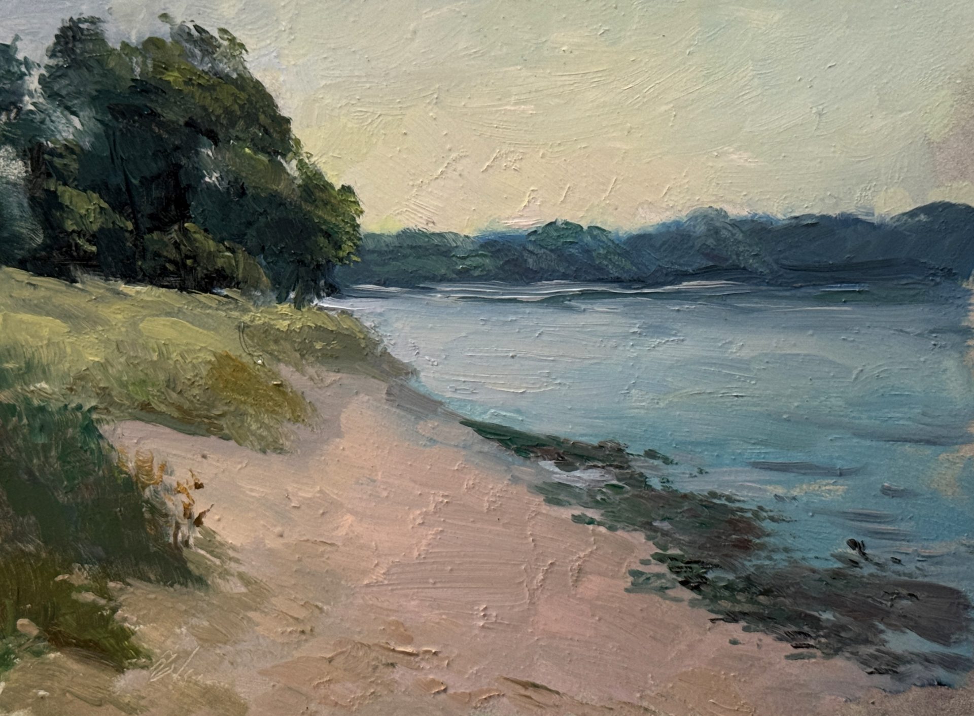 Oil painting of a peaceful shoreline at low tide, featuring sandy beach, calm blue water, and lush green trees under a soft sky.