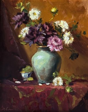 The Dancing Dahlias, 14x11, Oil on Panel Alt text: Still life oil painting of dahlias in a vase with purple, pink, and white flowers, set against a warm golden background with a draped red cloth.