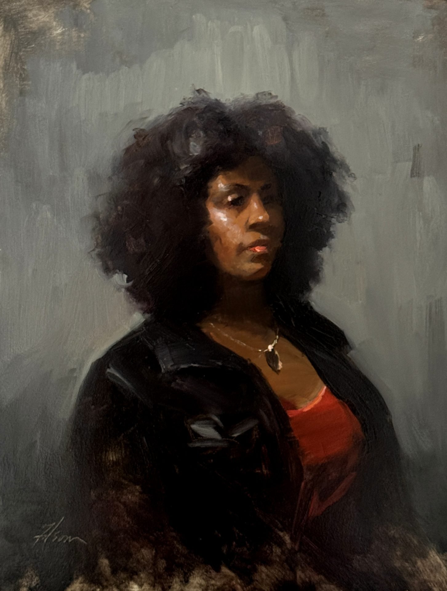 Contemplative Reflections in Red and Black, oil portrait painting by Kelli Folsom, depicting a Black woman with natural hair, wearing a red shirt and black jacket, gazing thoughtfully against a gray background.