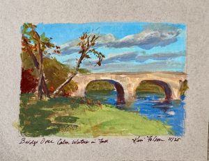 Gouache artwork of an arched stone bridge over calm blue water, surrounded by fall foliage in warm reds, greens, and golds.
