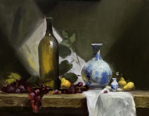 Oil still life painting featuring a green glass bottle, blue and white ceramic vase, grapes, and pears on a draped table in soft, atmospheric light.