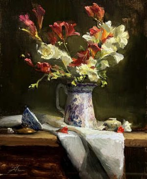 Original oil still life painting of white and coral flowers arranged in a ceramic pitcher, set on a wooden table with a draped white cloth and soft dramatic light against a dark background.