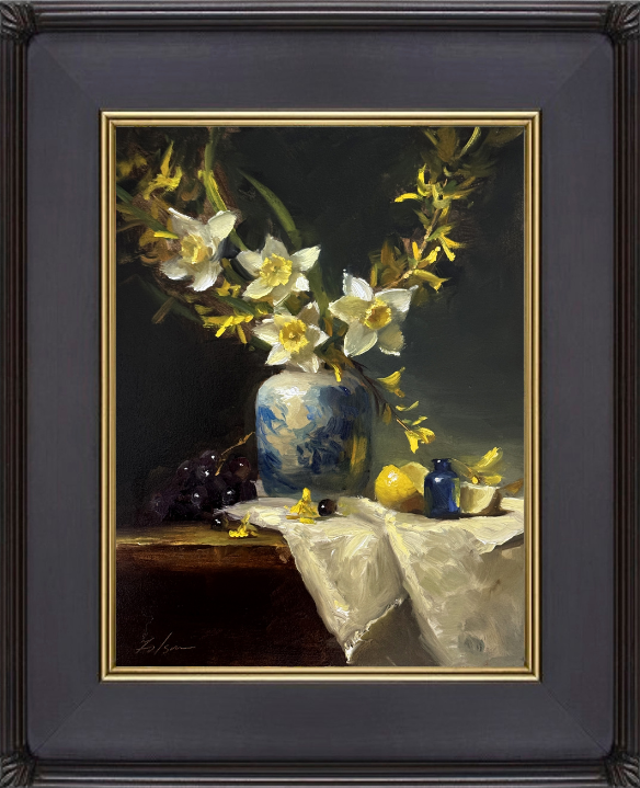 Impressionist still life oil painting of white and yellow spring flowers in a blue vase with grapes, lemon, and soft draped fabric