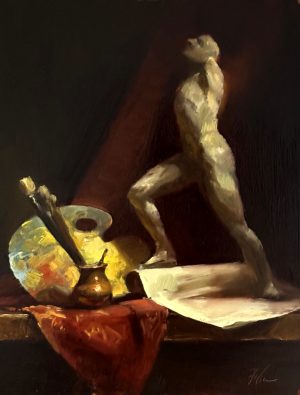 Oil painting of an artist’s studio still life with a wooden mannequin figure sketching beside brushes, palette, and draped cloth under warm dramatic lighting